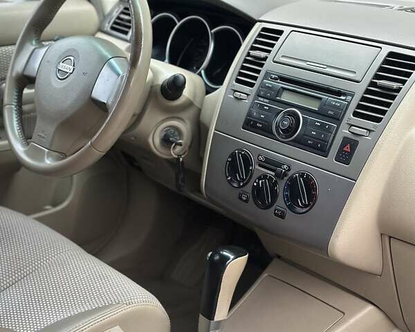 Бежевый Ниссан Тиида, объемом двигателя 1.6 л и пробегом 193 тыс. км за 4900 $, фото 43 на Automoto.ua