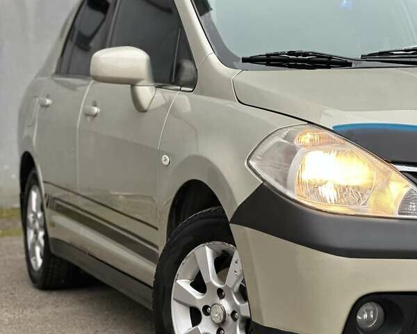 Бежевый Ниссан Тиида, объемом двигателя 1.6 л и пробегом 193 тыс. км за 4900 $, фото 14 на Automoto.ua