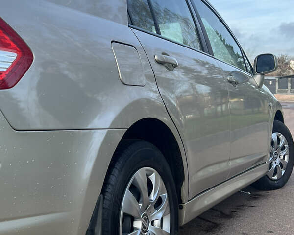 Бежевий Ніссан Тііда, об'ємом двигуна 1.6 л та пробігом 165 тис. км за 6600 $, фото 29 на Automoto.ua