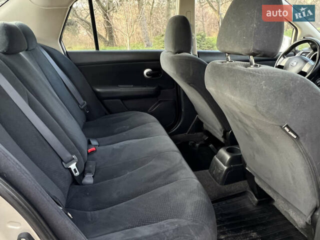 Бежевий Ніссан Тііда, об'ємом двигуна 1.6 л та пробігом 165 тис. км за 6600 $, фото 19 на Automoto.ua