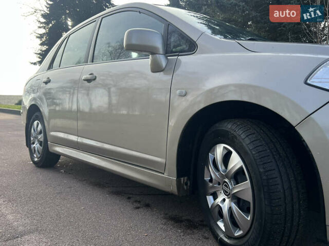 Бежевий Ніссан Тііда, об'ємом двигуна 1.6 л та пробігом 165 тис. км за 6600 $, фото 32 на Automoto.ua