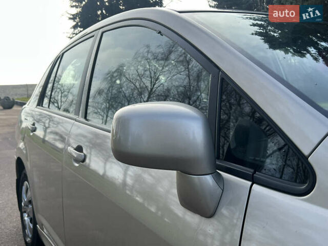 Бежевий Ніссан Тііда, об'ємом двигуна 1.6 л та пробігом 165 тис. км за 6600 $, фото 31 на Automoto.ua