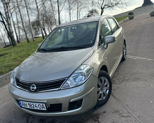 Бежевий Ніссан Тііда, об'ємом двигуна 1.6 л та пробігом 165 тис. км за 6600 $, фото 1 на Automoto.ua
