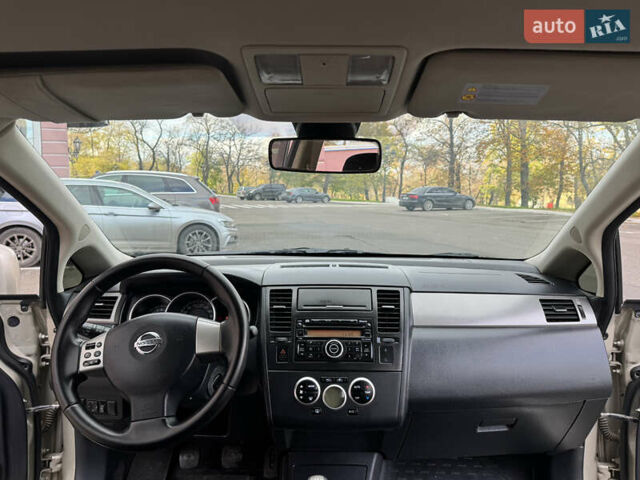 Бежевый Ниссан Тиида, объемом двигателя 1.6 л и пробегом 152 тыс. км за 6999 $, фото 18 на Automoto.ua