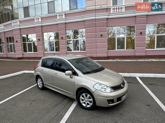 Бежевый Ниссан Тиида, объемом двигателя 1.6 л и пробегом 152 тыс. км за 6999 $, фото 6 на Automoto.ua