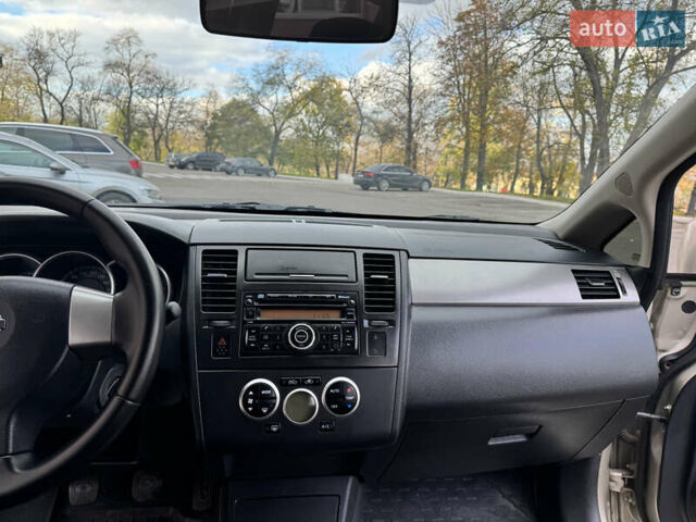 Бежевый Ниссан Тиида, объемом двигателя 1.6 л и пробегом 152 тыс. км за 6999 $, фото 22 на Automoto.ua