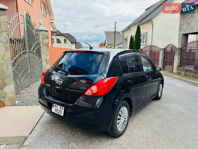 Черный Ниссан Тиида, объемом двигателя 1.6 л и пробегом 187 тыс. км за 5800 $, фото 26 на Automoto.ua