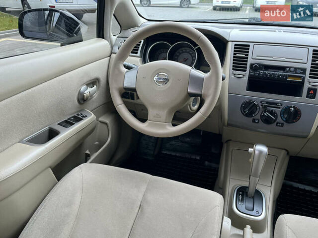 Черный Ниссан Тиида, объемом двигателя 1.6 л и пробегом 172 тыс. км за 6900 $, фото 25 на Automoto.ua