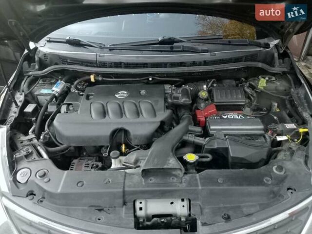 Чорний Ніссан Тііда, об'ємом двигуна 1.8 л та пробігом 215 тис. км за 5800 $, фото 4 на Automoto.ua