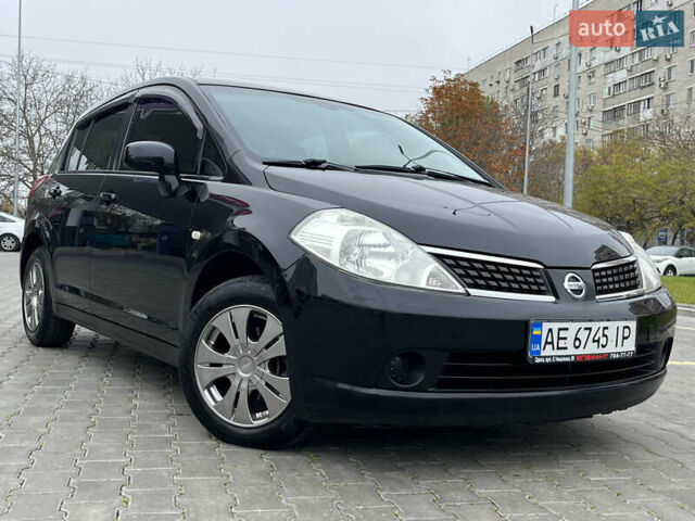 Черный Ниссан Тиида, объемом двигателя 1.6 л и пробегом 172 тыс. км за 6900 $, фото 5 на Automoto.ua