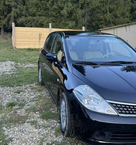 Черный Ниссан Тиида, объемом двигателя 1.6 л и пробегом 199 тыс. км за 5500 $, фото 1 на Automoto.ua