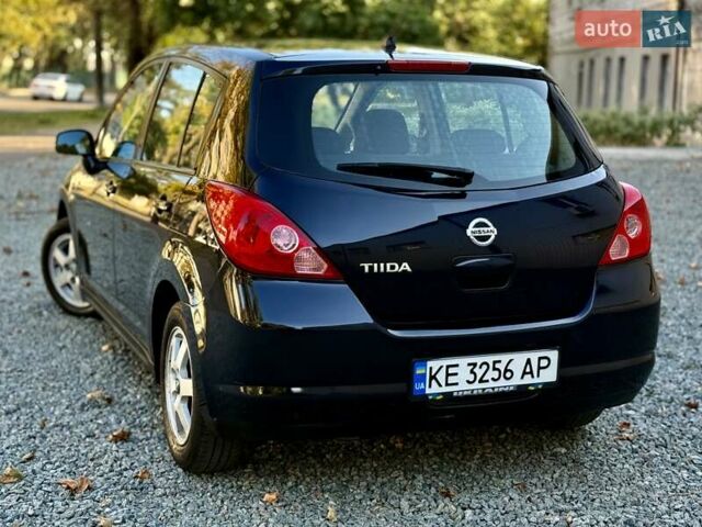 Черный Ниссан Тиида, объемом двигателя 1.6 л и пробегом 257 тыс. км за 5999 $, фото 2 на Automoto.ua
