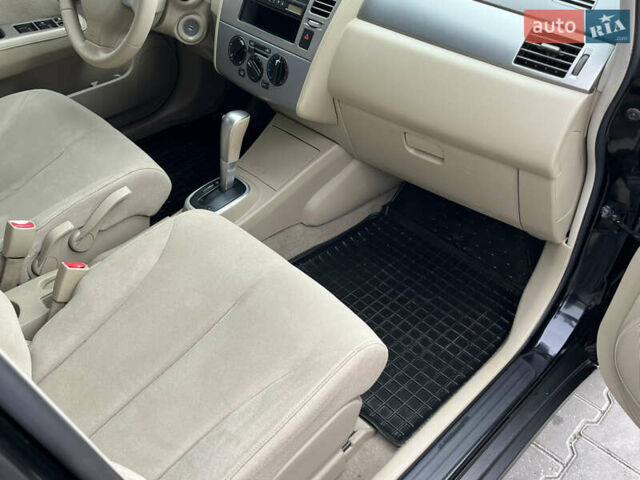 Черный Ниссан Тиида, объемом двигателя 1.6 л и пробегом 172 тыс. км за 6900 $, фото 36 на Automoto.ua