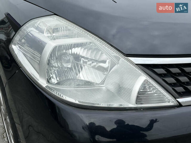 Черный Ниссан Тиида, объемом двигателя 1.6 л и пробегом 172 тыс. км за 6900 $, фото 14 на Automoto.ua