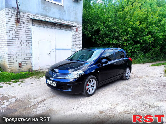 Черный Ниссан Тиида, объемом двигателя 1.8 л и пробегом 246 тыс. км за 3500 $, фото 1 на Automoto.ua