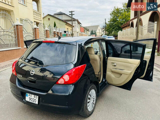 Черный Ниссан Тиида, объемом двигателя 1.6 л и пробегом 187 тыс. км за 5800 $, фото 1 на Automoto.ua