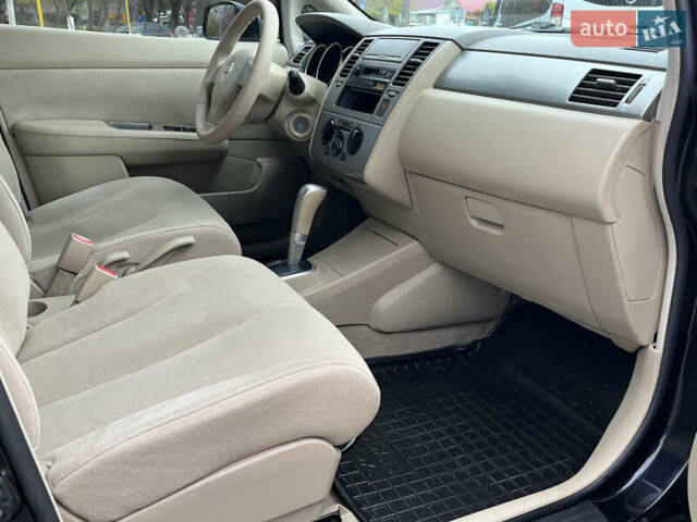 Черный Ниссан Тиида, объемом двигателя 1.6 л и пробегом 172 тыс. км за 6900 $, фото 35 на Automoto.ua