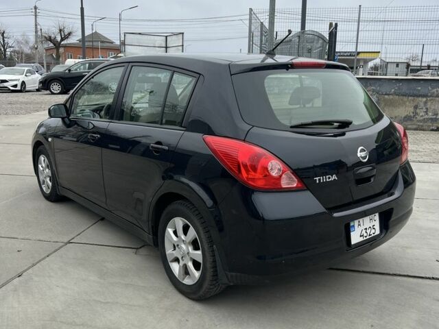 Черный Ниссан Тиида, объемом двигателя 1.6 л и пробегом 188 тыс. км за 5800 $, фото 7 на Automoto.ua