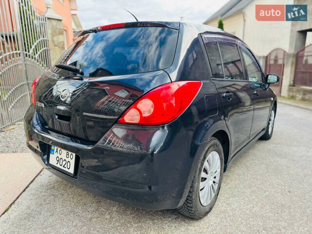 Черный Ниссан Тиида, объемом двигателя 1.6 л и пробегом 187 тыс. км за 5800 $, фото 30 на Automoto.ua