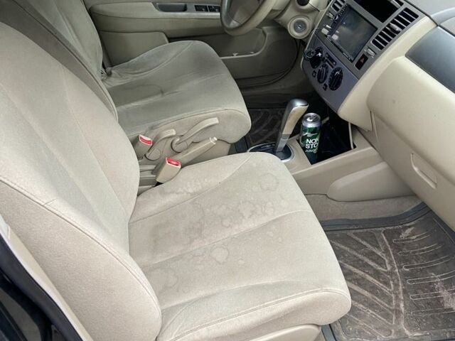 Черный Ниссан Тиида, объемом двигателя 1.6 л и пробегом 200 тыс. км за 4500 $, фото 4 на Automoto.ua