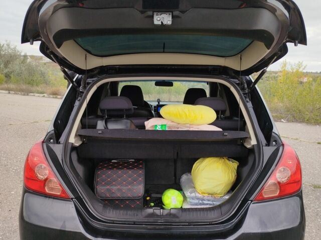 Черный Ниссан Тиида, объемом двигателя 1.6 л и пробегом 2 тыс. км за 6200 $, фото 1 на Automoto.ua