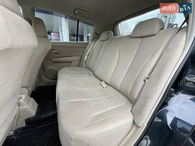 Черный Ниссан Тиида, объемом двигателя 1.6 л и пробегом 172 тыс. км за 6900 $, фото 43 на Automoto.ua