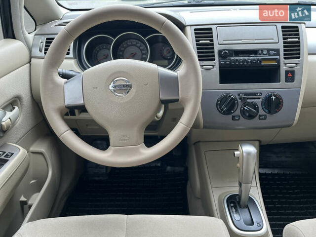 Черный Ниссан Тиида, объемом двигателя 1.6 л и пробегом 172 тыс. км за 6900 $, фото 23 на Automoto.ua