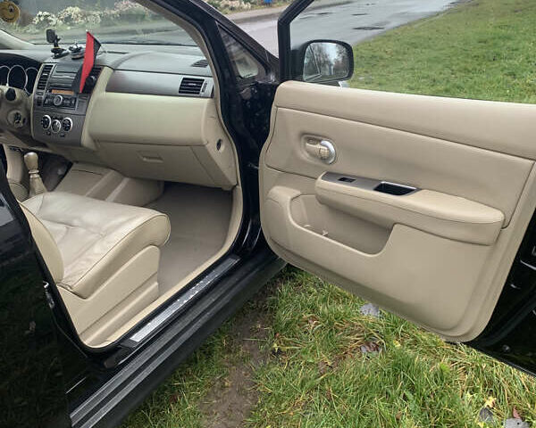 Черный Ниссан Тиида, объемом двигателя 1.46 л и пробегом 261 тыс. км за 5400 $, фото 14 на Automoto.ua