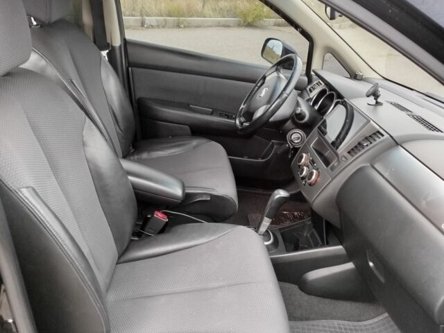 Черный Ниссан Тиида, объемом двигателя 1.6 л и пробегом 2 тыс. км за 6200 $, фото 4 на Automoto.ua