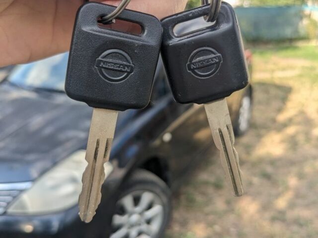 Чорний Ніссан Тііда, об'ємом двигуна 1.6 л та пробігом 209 тис. км за 3750 $, фото 6 на Automoto.ua