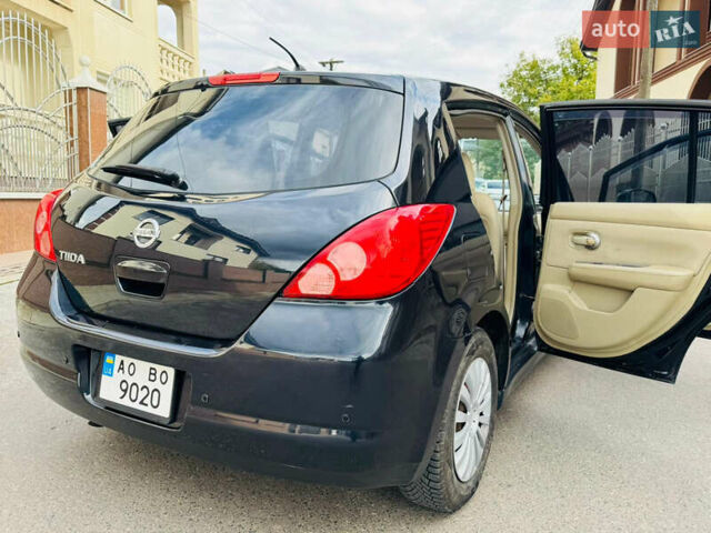 Черный Ниссан Тиида, объемом двигателя 1.6 л и пробегом 187 тыс. км за 5800 $, фото 45 на Automoto.ua