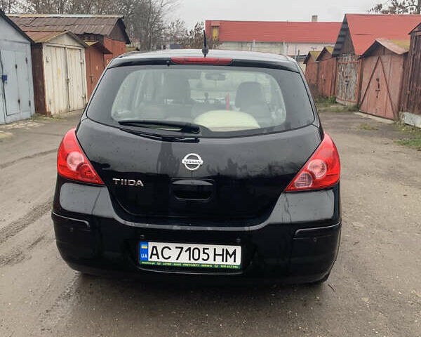 Черный Ниссан Тиида, объемом двигателя 1.46 л и пробегом 261 тыс. км за 5400 $, фото 10 на Automoto.ua