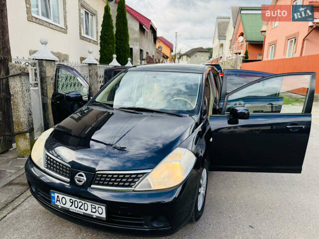 Черный Ниссан Тиида, объемом двигателя 1.6 л и пробегом 187 тыс. км за 5800 $, фото 63 на Automoto.ua