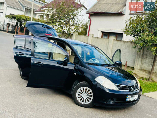 Черный Ниссан Тиида, объемом двигателя 1.6 л и пробегом 187 тыс. км за 5800 $, фото 52 на Automoto.ua