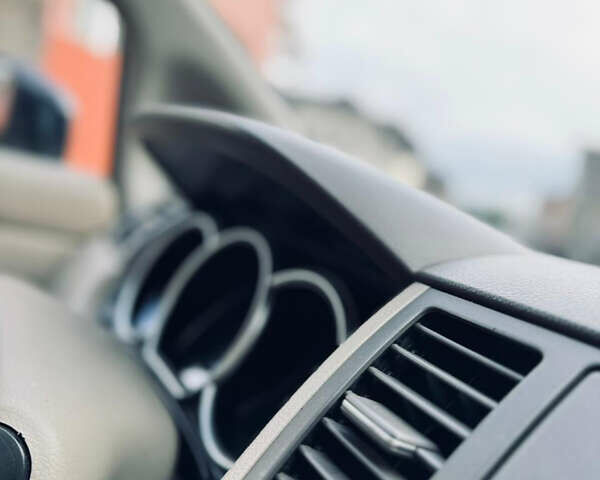 Черный Ниссан Тиида, объемом двигателя 1.6 л и пробегом 187 тыс. км за 5800 $, фото 17 на Automoto.ua