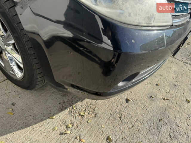 Черный Ниссан Тиида, объемом двигателя 1.6 л и пробегом 195 тыс. км за 5000 $, фото 9 на Automoto.ua