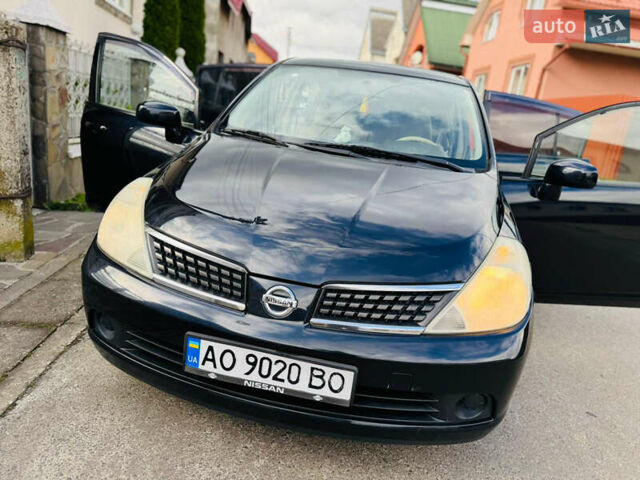 Черный Ниссан Тиида, объемом двигателя 1.6 л и пробегом 187 тыс. км за 5800 $, фото 82 на Automoto.ua