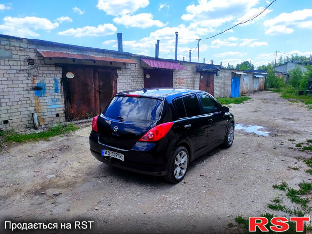 Черный Ниссан Тиида, объемом двигателя 1.8 л и пробегом 246 тыс. км за 3500 $, фото 3 на Automoto.ua