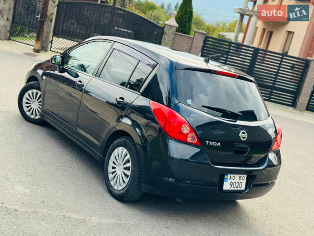 Черный Ниссан Тиида, объемом двигателя 1.6 л и пробегом 187 тыс. км за 5800 $, фото 77 на Automoto.ua
