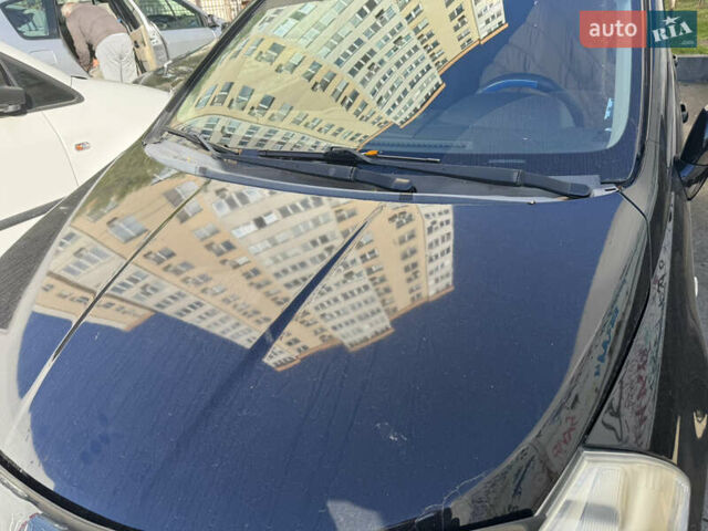 Черный Ниссан Тиида, объемом двигателя 1.6 л и пробегом 195 тыс. км за 5000 $, фото 7 на Automoto.ua