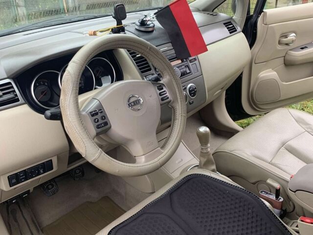 Черный Ниссан Тиида, объемом двигателя 1.5 л и пробегом 261 тыс. км за 5500 $, фото 6 на Automoto.ua