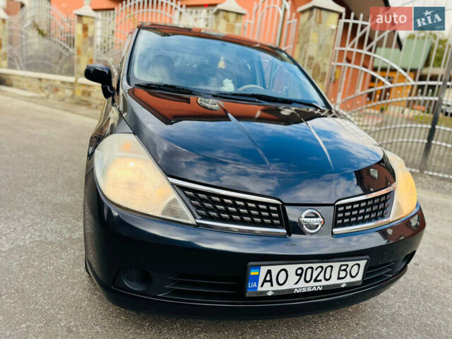 Черный Ниссан Тиида, объемом двигателя 1.6 л и пробегом 187 тыс. км за 5800 $, фото 7 на Automoto.ua