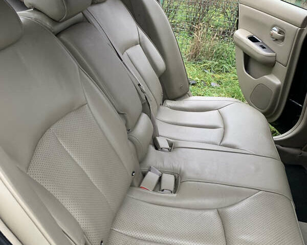 Черный Ниссан Тиида, объемом двигателя 1.46 л и пробегом 261 тыс. км за 5400 $, фото 4 на Automoto.ua