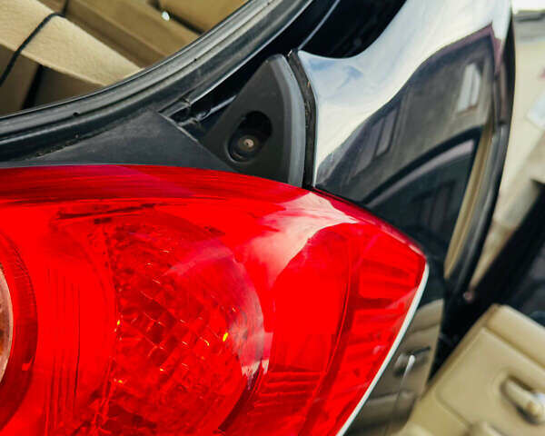 Черный Ниссан Тиида, объемом двигателя 1.6 л и пробегом 187 тыс. км за 5800 $, фото 24 на Automoto.ua