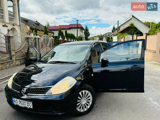 Черный Ниссан Тиида, объемом двигателя 1.6 л и пробегом 187 тыс. км за 5800 $, фото 58 на Automoto.ua
