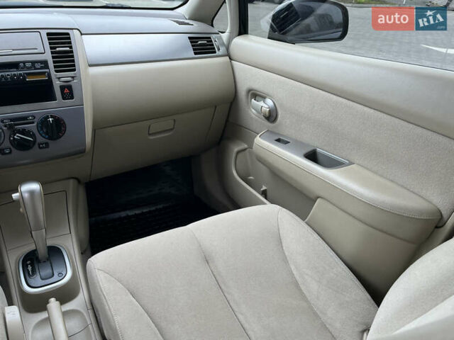 Черный Ниссан Тиида, объемом двигателя 1.6 л и пробегом 172 тыс. км за 6900 $, фото 24 на Automoto.ua