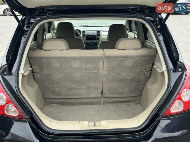 Черный Ниссан Тиида, объемом двигателя 1.6 л и пробегом 172 тыс. км за 6900 $, фото 45 на Automoto.ua