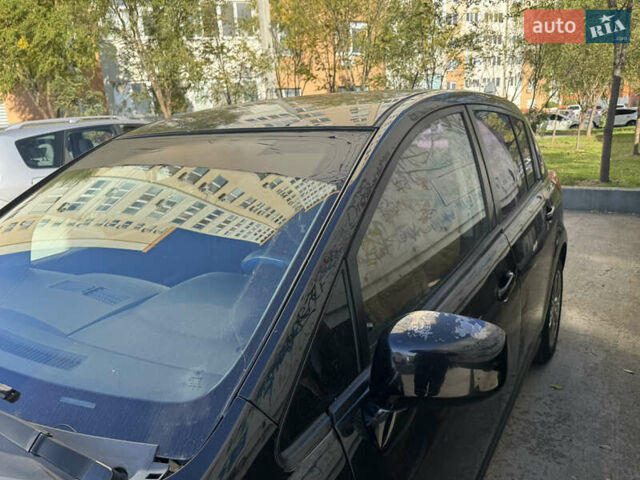 Черный Ниссан Тиида, объемом двигателя 1.6 л и пробегом 195 тыс. км за 5000 $, фото 6 на Automoto.ua