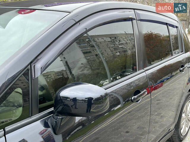 Черный Ниссан Тиида, объемом двигателя 1.6 л и пробегом 172 тыс. км за 6900 $, фото 15 на Automoto.ua