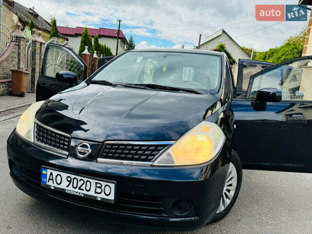 Черный Ниссан Тиида, объемом двигателя 1.6 л и пробегом 187 тыс. км за 5800 $, фото 44 на Automoto.ua